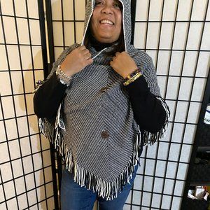Brand New Black and White Hooded Poncho with wooden buttons that fits up to a 1X